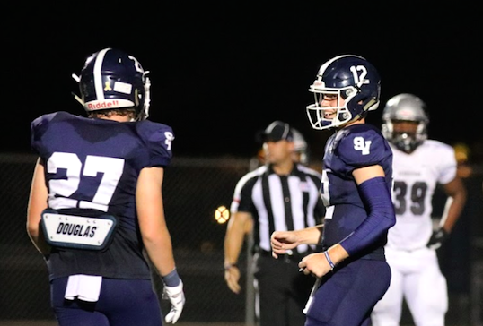 Luke Gombert and Garrett Brooks celebrate a touchdown against Pflugerville Hendrickson. Gombert threw for two touchdowns this week in a win over San Antonio Madison.