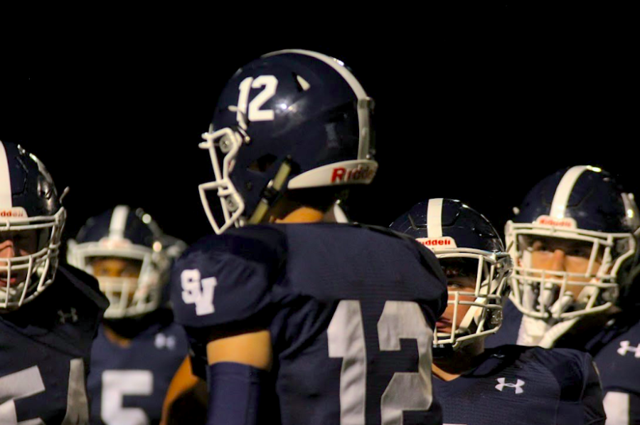 QB Luke Gombert leads the huddle during a game against Schertz Clemens. Gombert threw for three touchdowns this week in a win against New Braunfels Canyon.