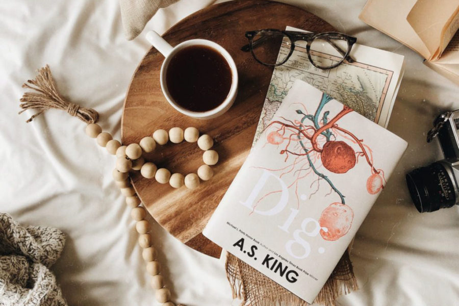 This year's book club finished their first group novel selection, "Dig" by A.S. King.