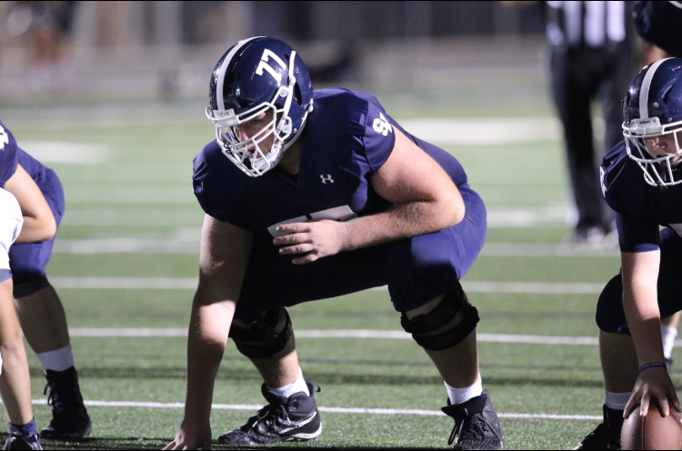 Colton Thomasson lines up at right guard.  Thomasson made varsity as a freshman