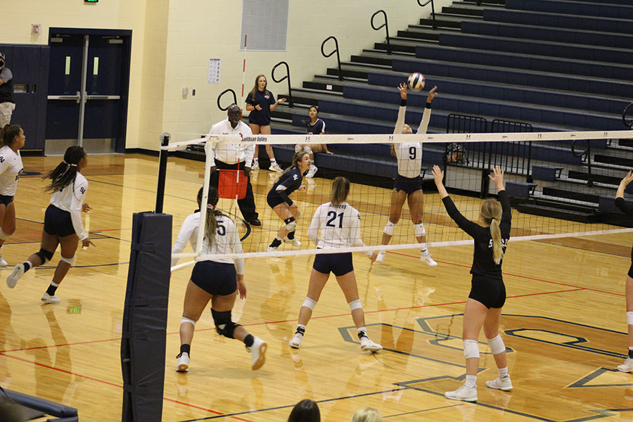 Esther Duglas sets a ball at a home match against steele