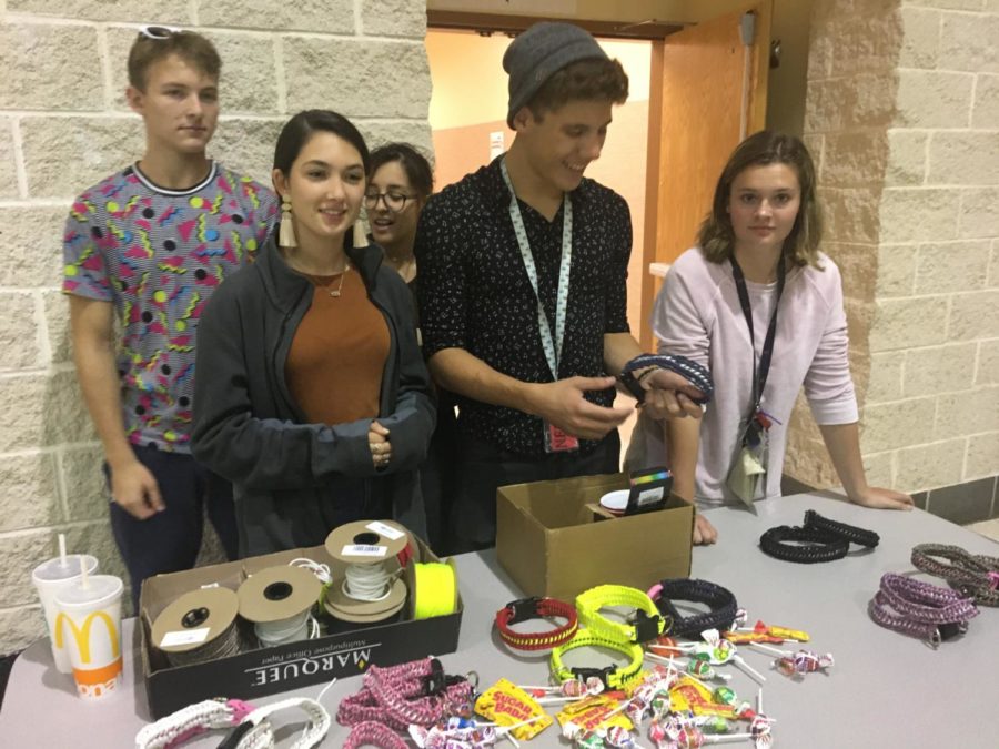 With their collection of dog collars, juniors Adrianna Krueger, Summer Williams, Hadley Thomas, Nathan Boyd and Dewitt Maxwell sell them to raise money to buy canine units for military and police personnel. The group calls itself Sean's Canines.
