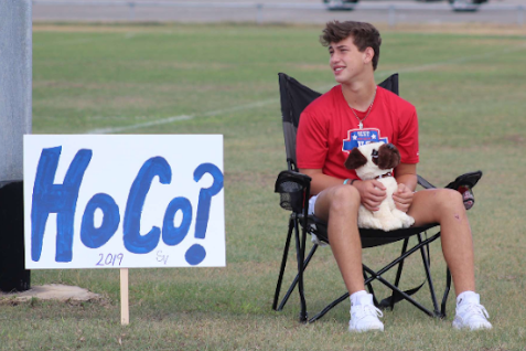 With a series of posters on Sept. 22, freshman Michael Mayhugh invites Zoie Saucedo to the homecoming dance.