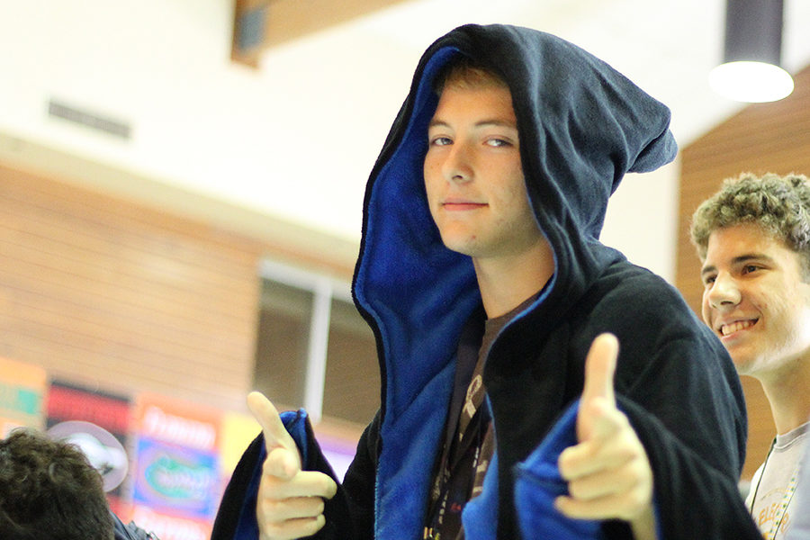 Dressed in his wizarding robe, junior DeWitt Maxwell kicks off Spirit Week by participating in PJ Day.
