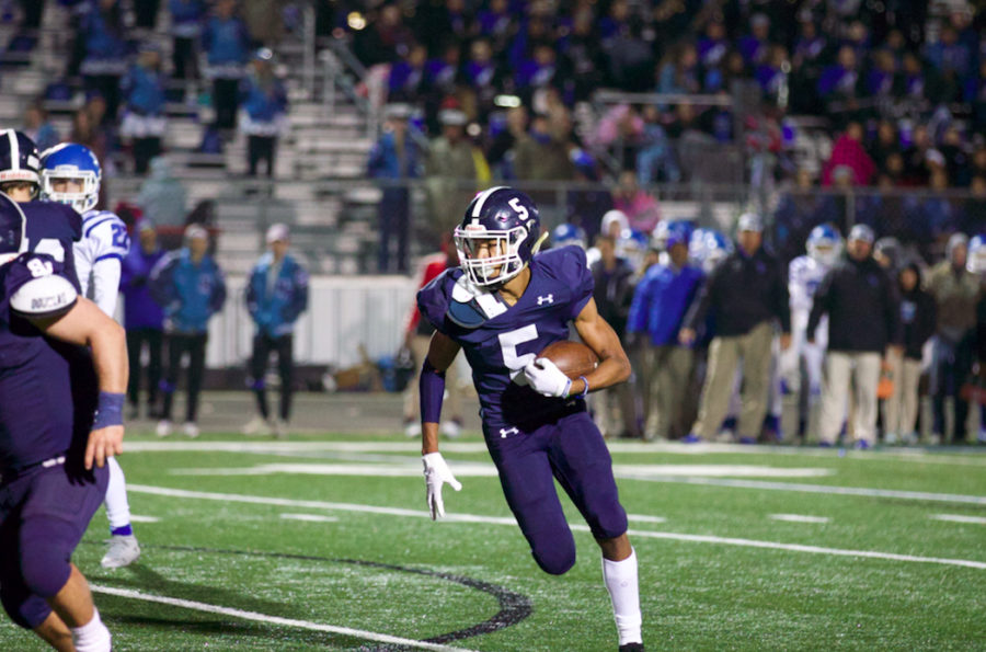 Greg Eggleston totes the rock against New Braunfels. Eggleston will play a major role in the Rangers' upset bid.