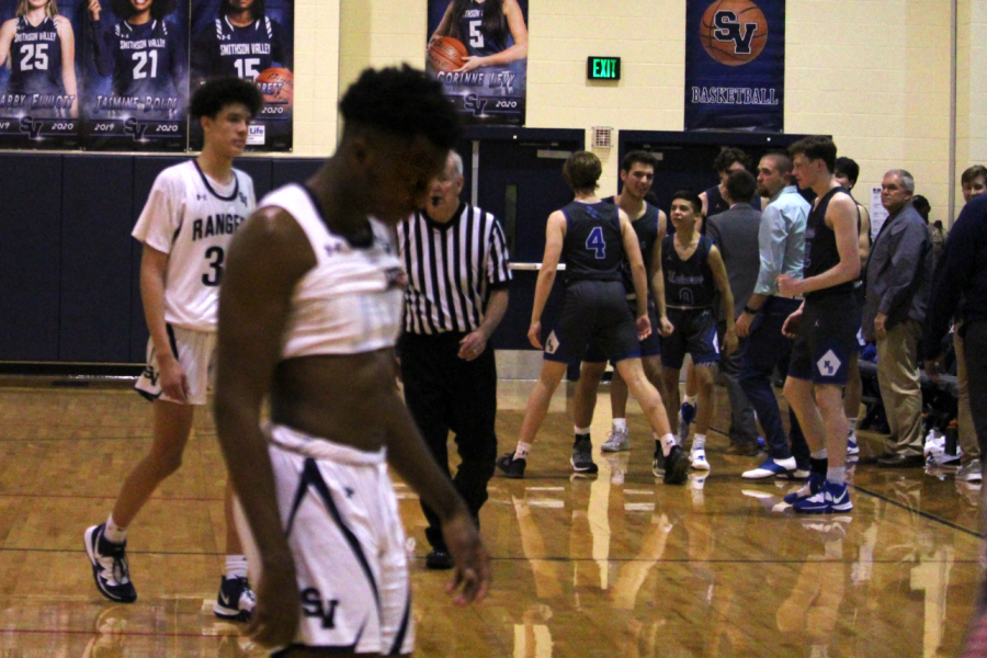 Devante Mount walks to the locker room after losing to New Braunfels earlier this season. Mount scored 13 points in Tuesday night's playoff loss to Austin Anderson.