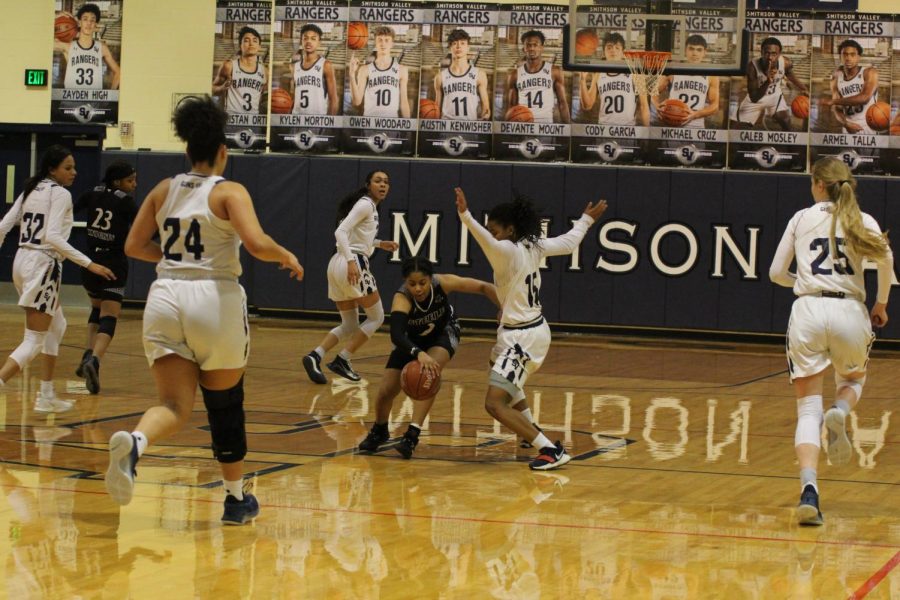 Junior Trinity Garrett defends a fast break during Tuesday's game against Steele. Garrett scored 20 points in the win, setting up a tiebreaker with Steele on Friday.