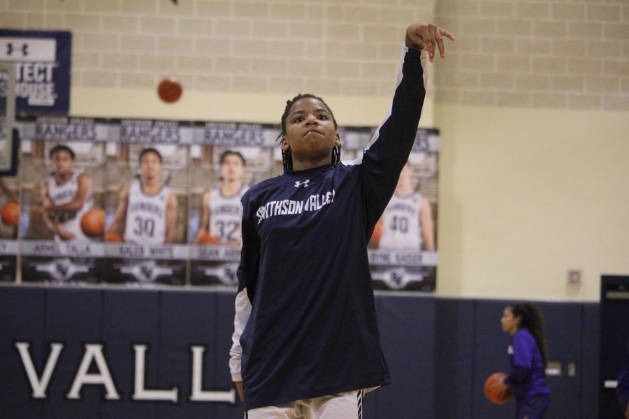Trinity Garrett warms up prior to a game against San Marcos. Garrett and the Rangers lost to Westlake on Tuesday, 63-34.