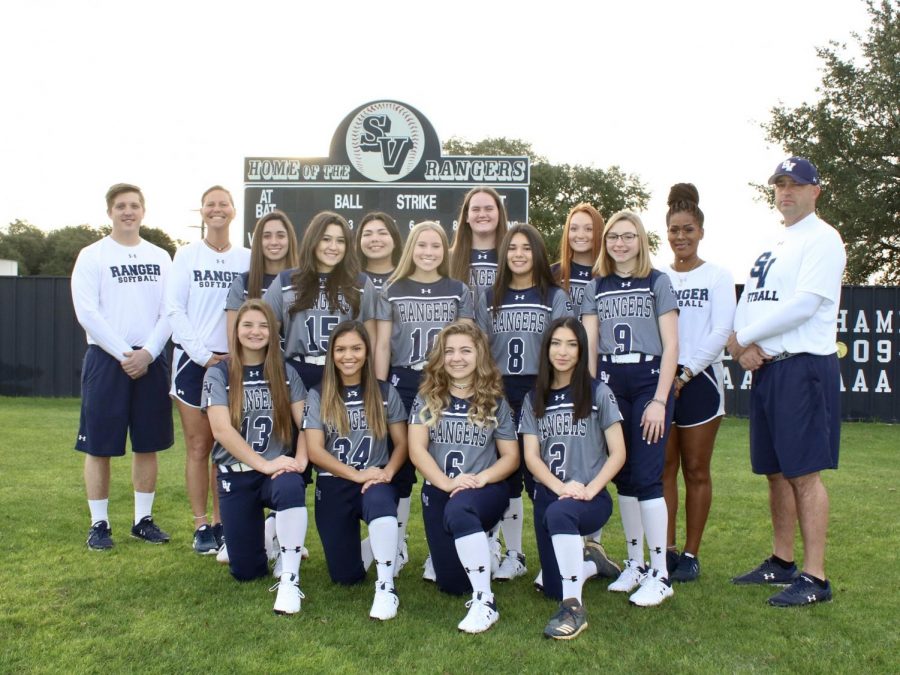 The softball team poses before the 2019-2020 season. The team was 13-6 before COVID-19 shut down the season.