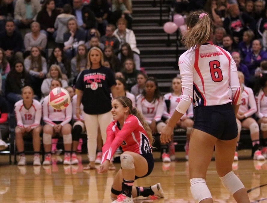 Ashley Acuna digs at the pink out game