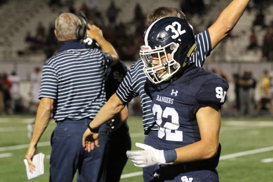 Travis McCracken walks the sideline during the opener against Harker Heights. McCracken scored his first varsity touchdown this week against Madison.