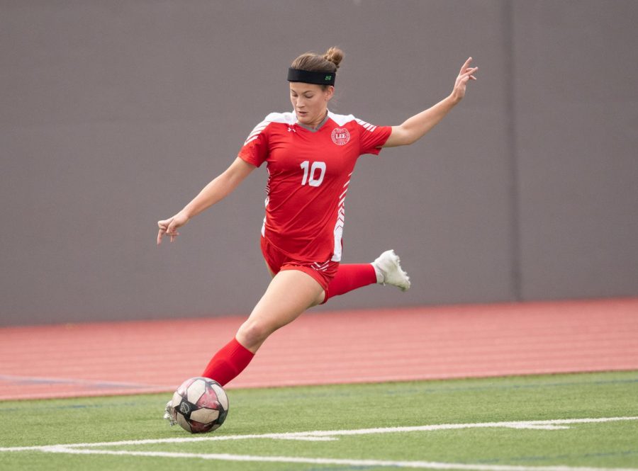 Senior forward Helene Farris kicks a ball in her LEE uniform. Farris will play a key role on this year's team.