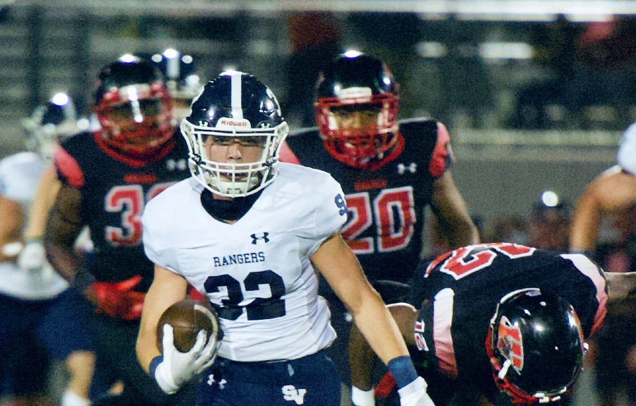 Junior running back Travis McCracken evades Wagner's defense on Oct. 9. McCracken scored his first varsity touchdown in last night's game against Clemens.