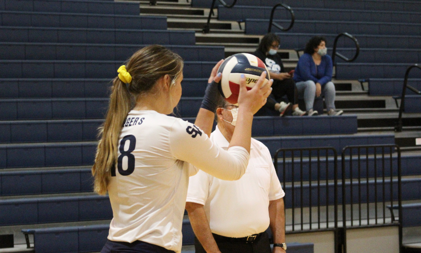 Sophomore Reagan Elizondo prepares to serve as the Rangers hots South San.