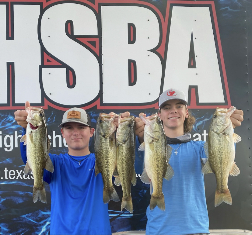 Junior Mason McClellan and sophomore Ryder Cunningham showoff the day's catch.