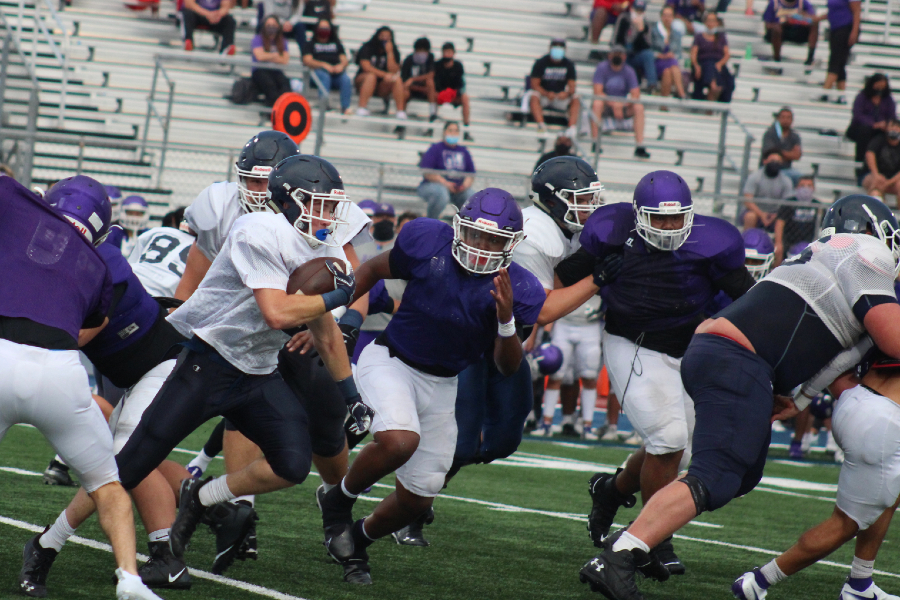 The offense runs the ball during a preseason scrimmage against San Marcos. This season, the Rangers ran for 1,895 yards and 31 touchdowns.