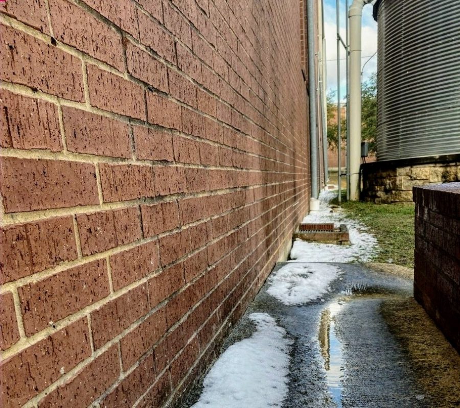 As of yesterday's surprising weather, left over snow still sticks to the sides of the building.