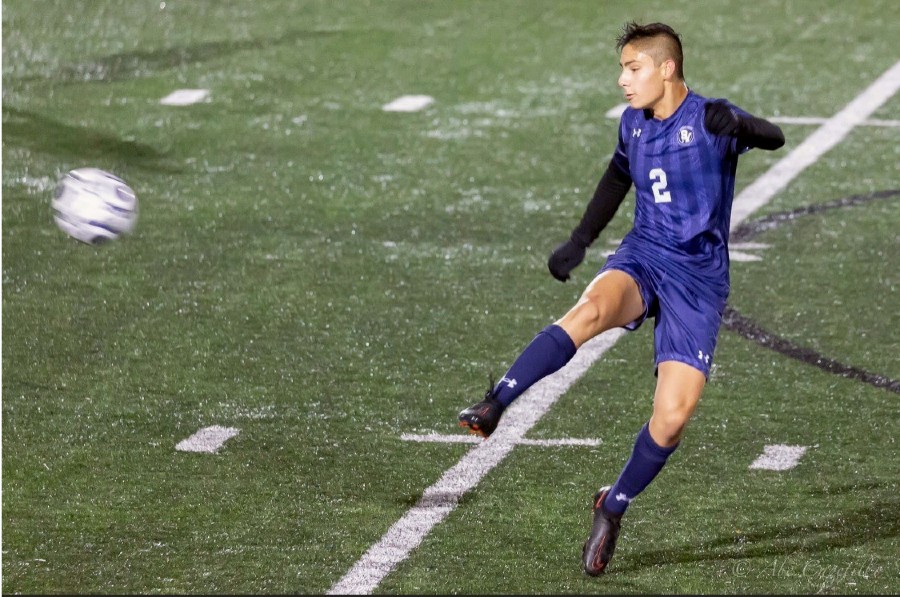 Sophomore Matthew Capetillo chips the ball out of the Ranger's middle third against McCollum. The boys beat the Cowboys 3-0, taking their fifth and final win of the preseason.