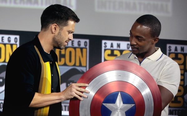 Sebastian Stan (Bucky Barnes) and Anthony Mackie (Sam Wilson) hold Captain America's "vibranium" shield. Steve Rogers passed the shield to Wilson in the last Avengers' film.