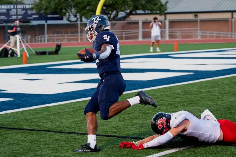 Malachi Lane rumbles into the end zone for a 61-yard touchdown on Friday against Wagner. Lane also blocked a punt a recovered a fumble, which he returned for another score, in football's 42-14 win over the Thunderbirds.