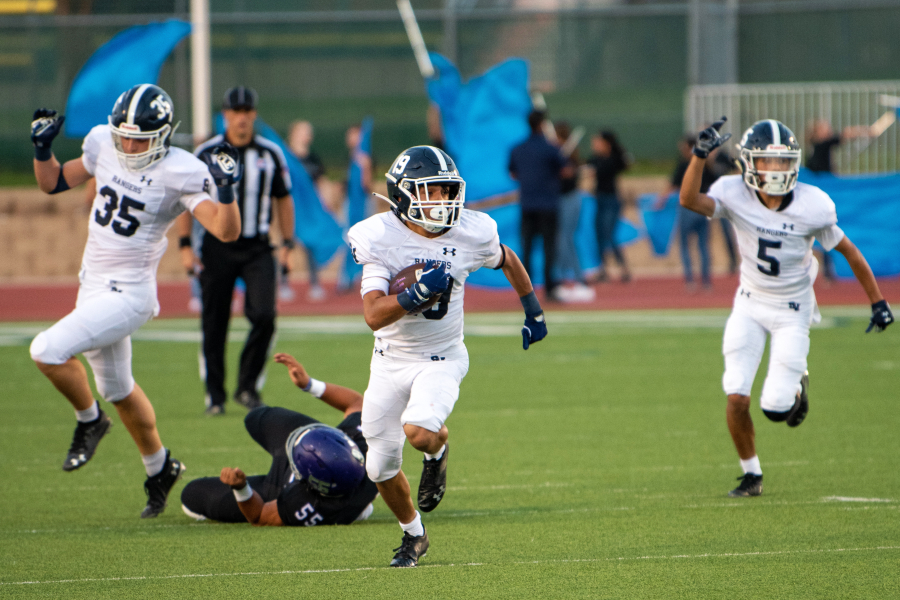 Brayden Bafidis outruns the Warren defense en route to the end zone. Bafidis led the Rangers' dynamic kick return unit, which could play a big role in this week's showdown with Madison.