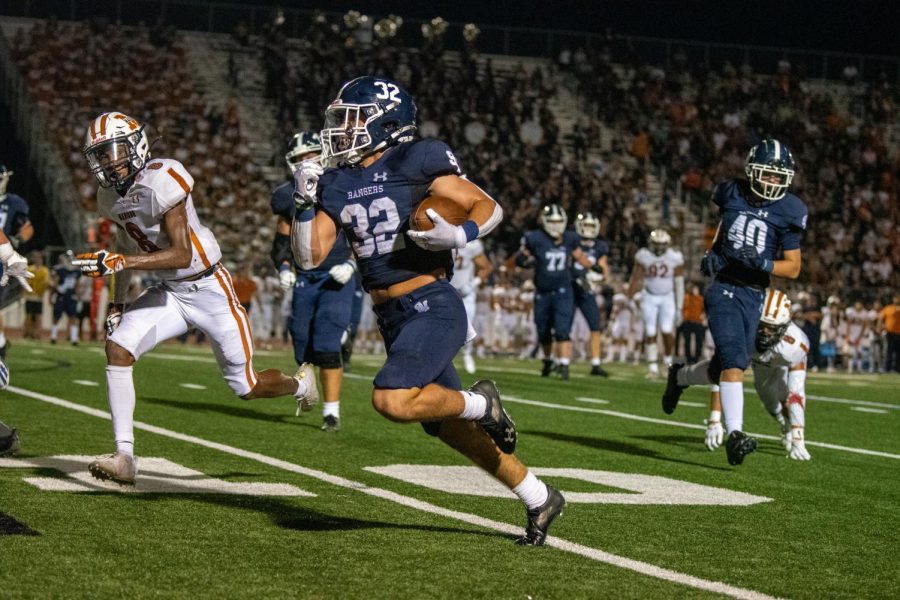 Travis McCracken sprints for a first down against Madison on Sept. 3. McCracken rushed for 154 yards and 2 touchdowns on Friday against El Paso Eastwood.