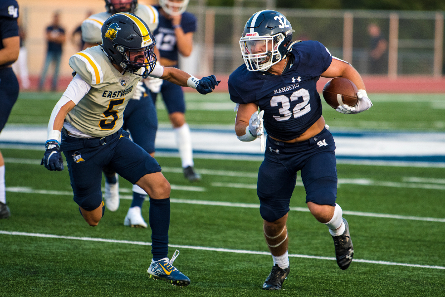 Travis McCracken fights upfield on Sept. 10 against El Paso Eastwood. McCracken, a running back, leads all Rangers with 336 yards from scrimmage.