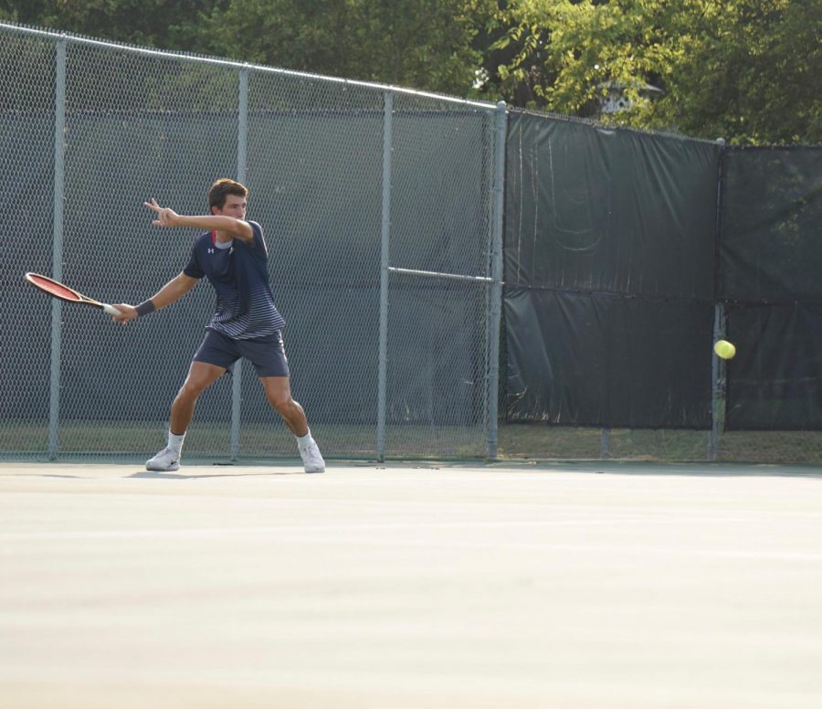 Luke Cantu hits a forehand.