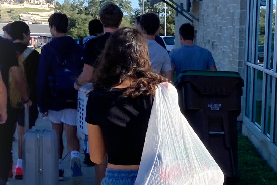 Smithson Valley students participate in anything but a backpack day for red ribbon week. They bring trash bags and other things to carry their school items. 