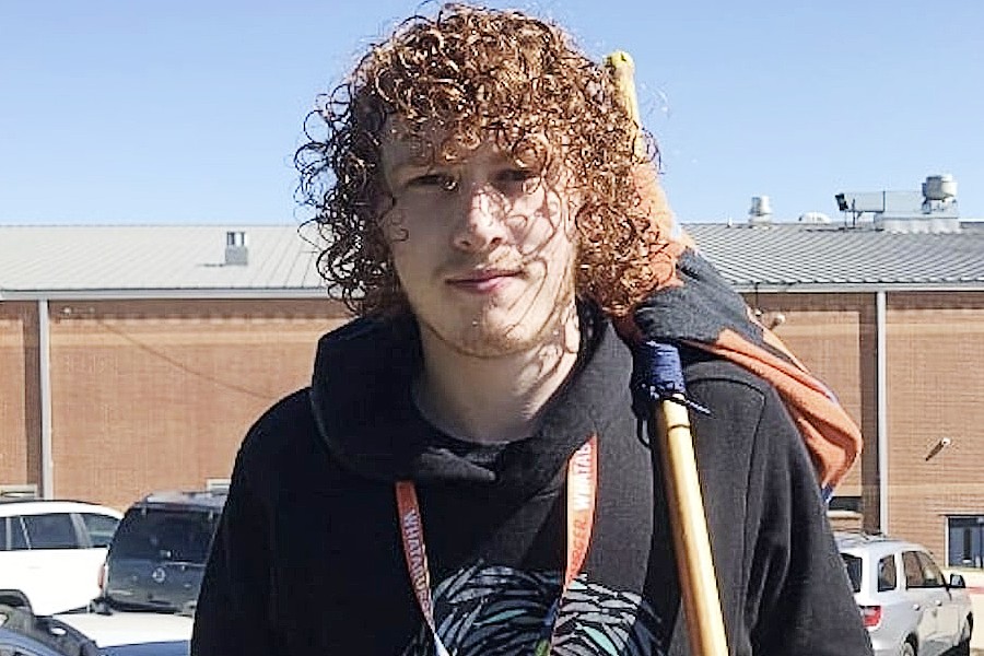 Tyler Allen wears his hobo 'backpack' to school on October 27th for Red Ribbon Week. He carried his notebooks, binder, and pencils in a towel tied on a wooden stick.