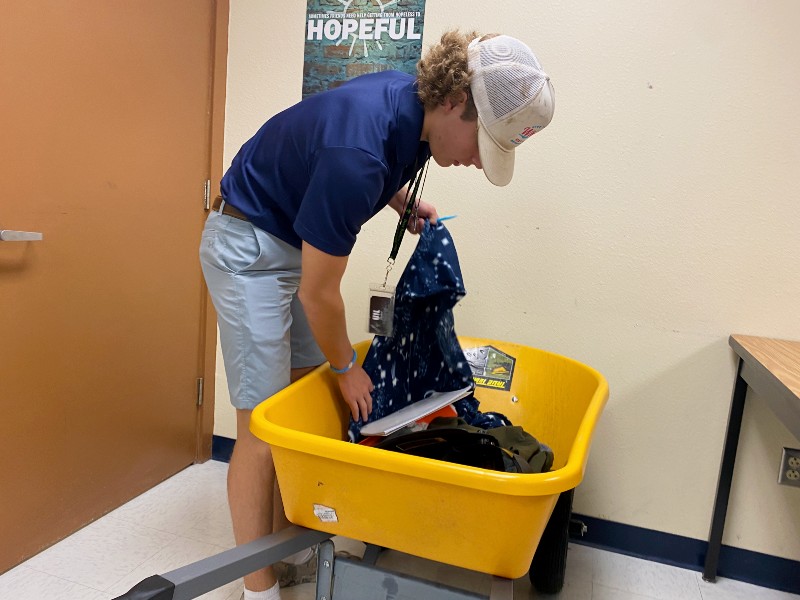 Julian Johnson brings a wheelbarrow for Anything But a Backpack. "Coach Randall started laughing and I got a few funny looks."
