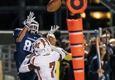 Junior T.J. Hunt receives the ball for a touchdown in the Ranger's bi-district game against Madison. 