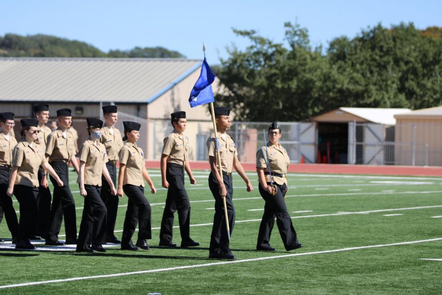 The Junior Reserve Officer's Training Corps marched on the football field during the Veteran's Day assembly.