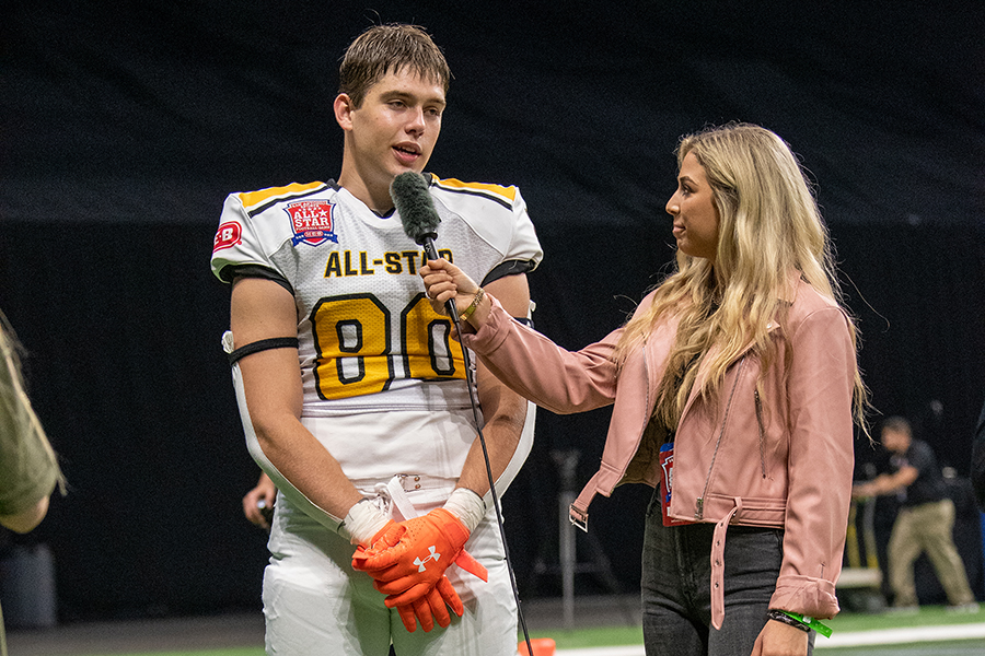 Staff writer Reeve Bonser interviews Dylan Domel after Team Gold's 18-9 victory. Lane earned first team All-District 27-6A honors after catching 26 passes for 486 yards and seven touchdowns.