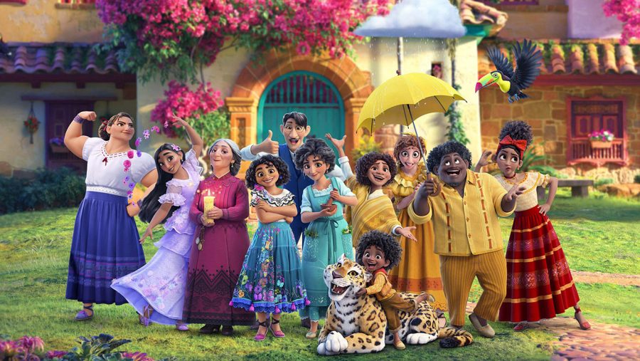 ENCANTO, from left: Luisa Madrigal (voice: Jessica Darrow), Isabela Madrigal (voice: Diane Guerrero), Abuela Alma (voice: Maria Cecilia Botero), Mirabel Madrigal (voice: Stephanie Beatriz), Augustin Madrigal (voice: Wilmer Valderrama), Julieta Madrigal (voice: Angie Cepeda), Camilo Madrigal (voice: Rhenzy Feliz), Pepa Madrigal (voice: Carolina Gaitan), Felix Madrigal (voice: Mauro Castillo), Dolores Madrigal (voice: Adessa); Antonio Madrigal (voice: Ravi Cabot-Conyers), 2021. © Walt Disney Studios Motion Pictures / Courtesy Everett Collection