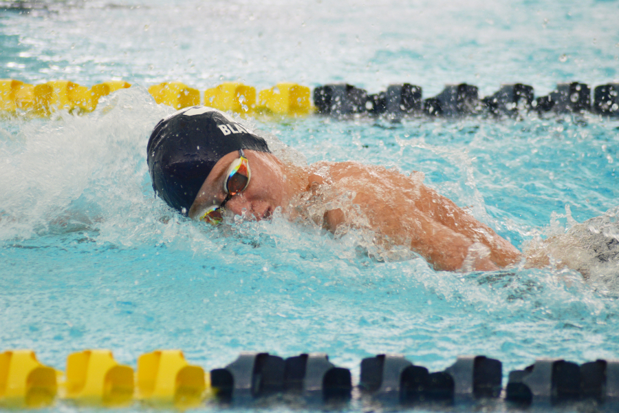Carson Blair swims his 500 meter freestyle at the regional championships last Febuary. 