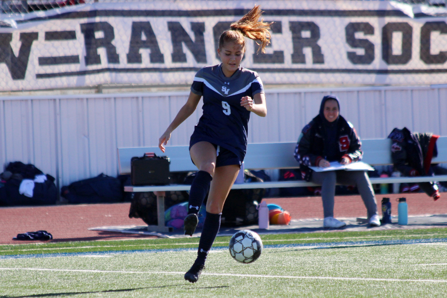 Sabrina Taber corrals a pass in a 10-0 win over MacArthur on Jan. 6. The UIL's latest round of realignment placed the Rangers and Brahmas in the same Class 5A football district.