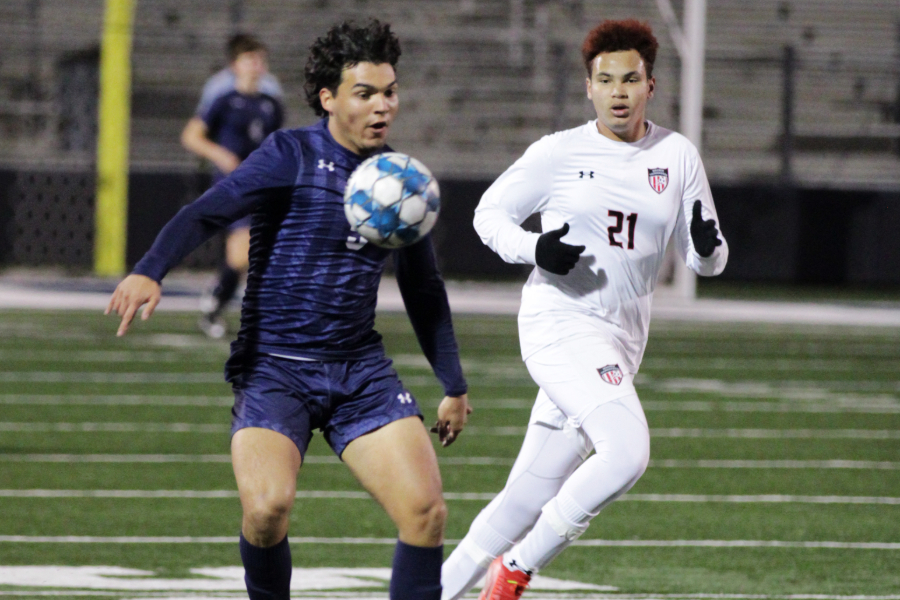 Tristan Herrera dribbles down the field against Clemens on Feb 25.