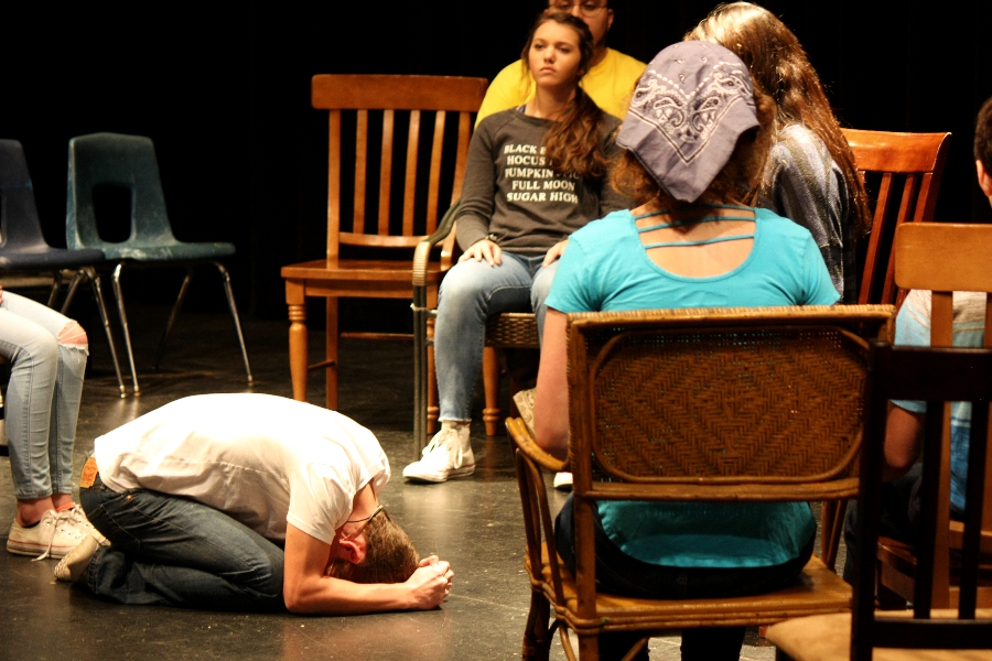 Playing the role of George Gibbs in "Our Town," then-freshman Jackson Posey (left) weeps at his wife's grave during a performance in Oct. 2018. Posey has performed in nine shows for Smithson Valley, including his current role as Barnabas in "The Castle."