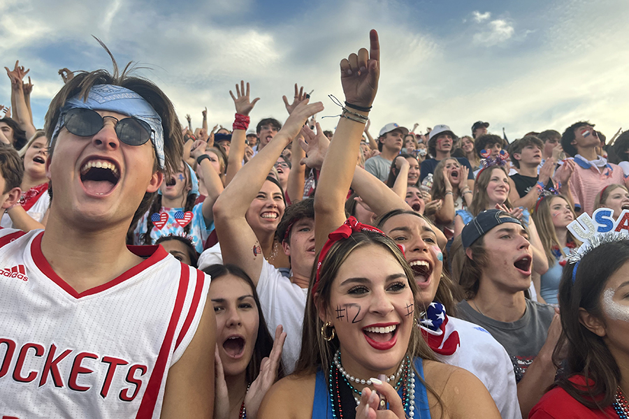 The student section cheered on the football team at last week's game.