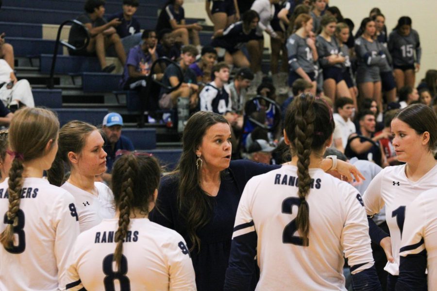 Head Coach Melissa Miller talks to the team before their game against Pieper.