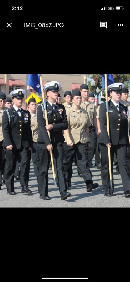 NJROTC cadets Aspen and Phoebe Lee, Lauren Robinson and Paige Day march in the Comal County Fair Parade on Sept. 23.