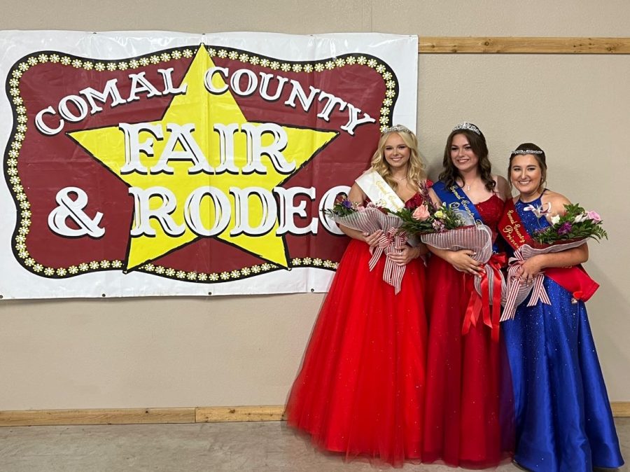 Comal County Fair Duchess Claire Schaeferkoeter celebrates with fair queen Peyton Wirebaugh and princess Jacy Welch.
