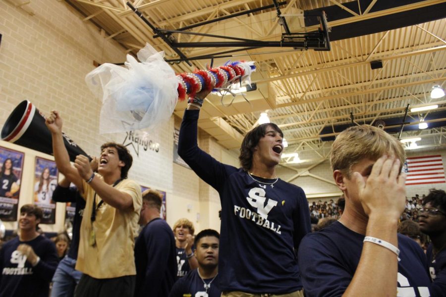 Senior Chase Senelick celebrates after the seniors won the spirit stick at last week's pep rally.