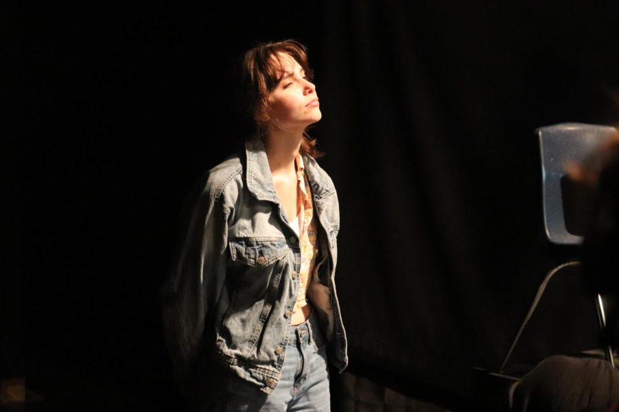 Kinsey Norman enters stage left during Act I.