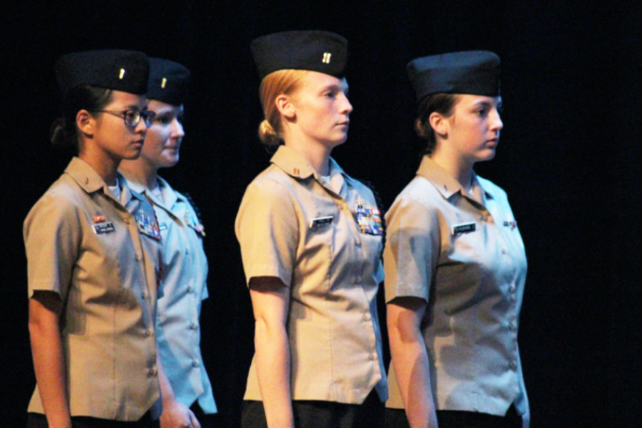 The unarmed drill team enters the stage for its portion of the Veterans Day ceremomy.