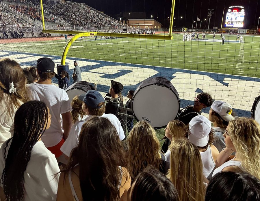 Drumline performs in the student section at Friday night's game against Seguin. 