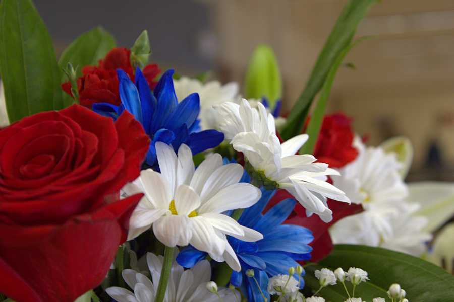 An array of red, white and blue flowers decorate the cafeteria for Friday's breakfast for veterans.