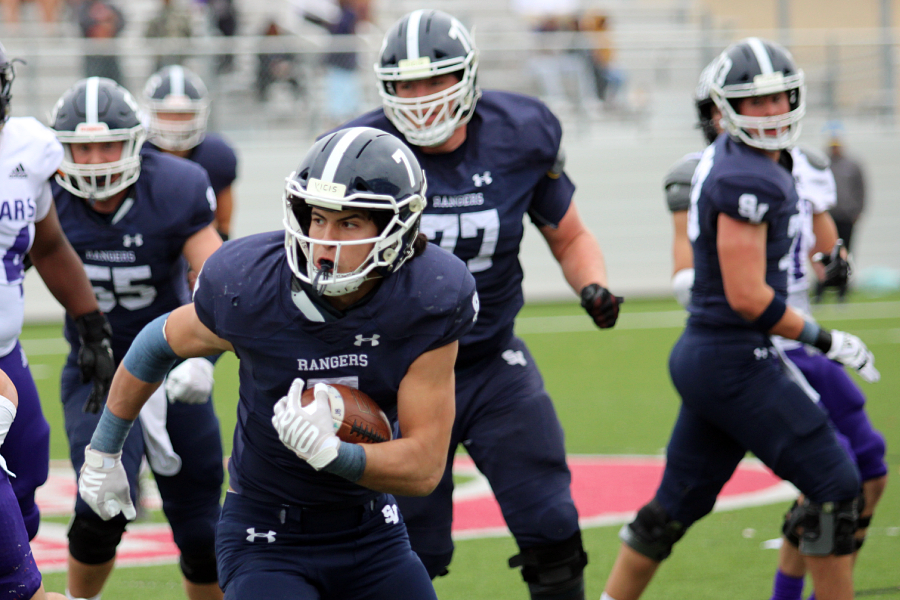 During the quarterfinal game against College Station, senior running back David DeHoyos breaks free on one of his 11 rushes and 54 yards Dec. 3. De Hoyos played offense and defense throughout the season, earning first team all-district honors as a safety.