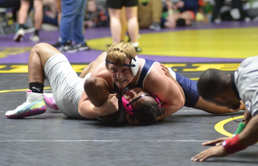 Junior Dylan Gass Pins a state ranked opponent at the THSWCA state duals last Friday.